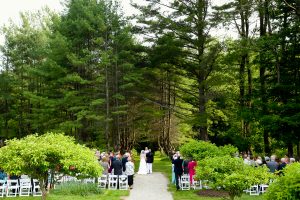 A wedding ceremony at Seven Hills on the back lawn